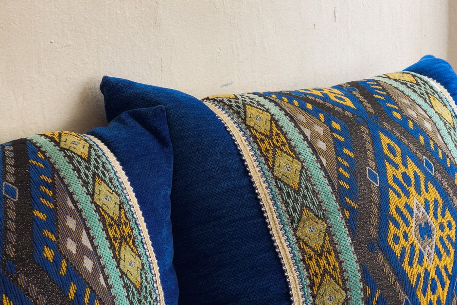 Close-up of mixed-texture and patterned throw pillows