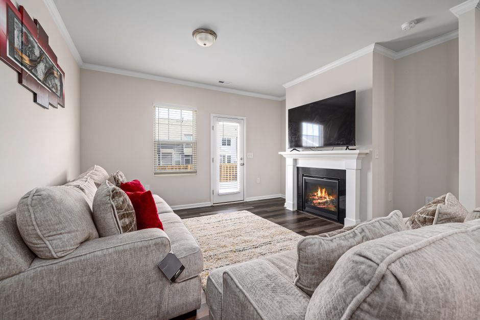 A cozy living room painted in a warm neutral