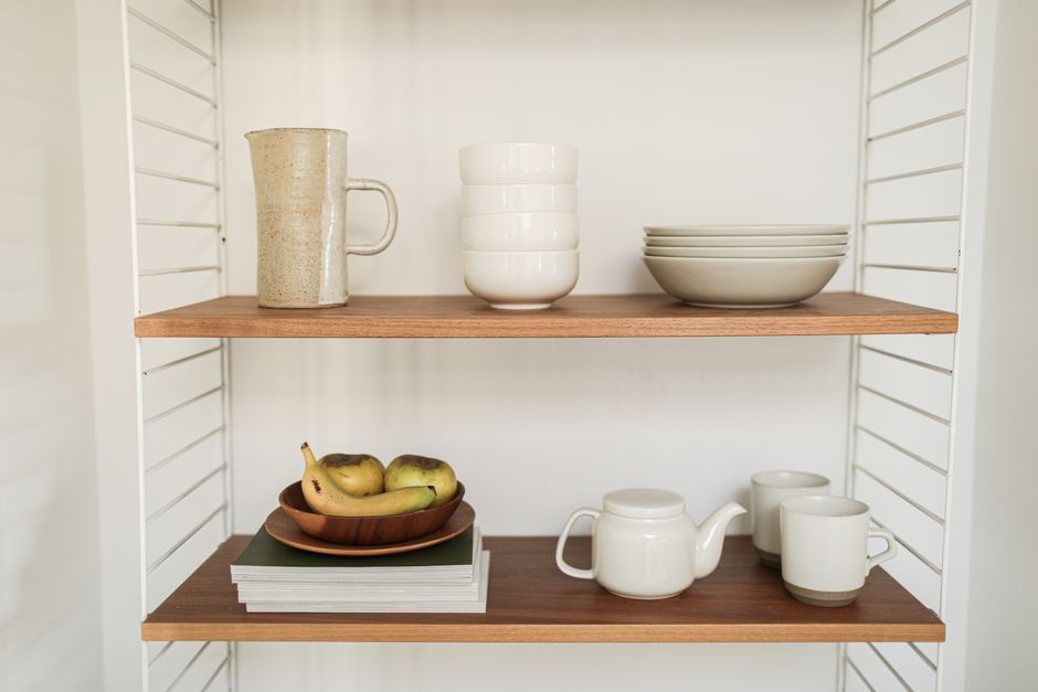 A layered kitchen shelf display