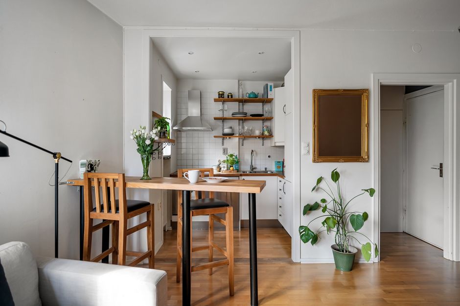 furniture floated slightly off the wall in a compact living room