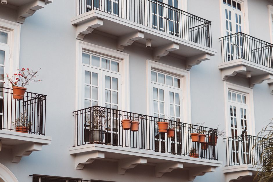 Railing planters keep floor space clear for seating