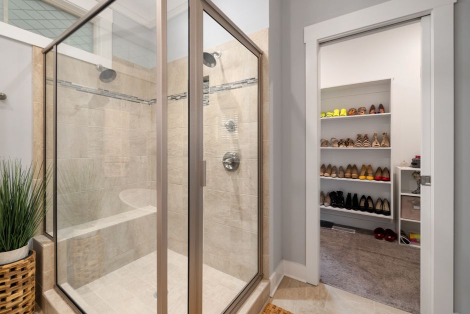 Over-the-door organizer holding shoes and accessories