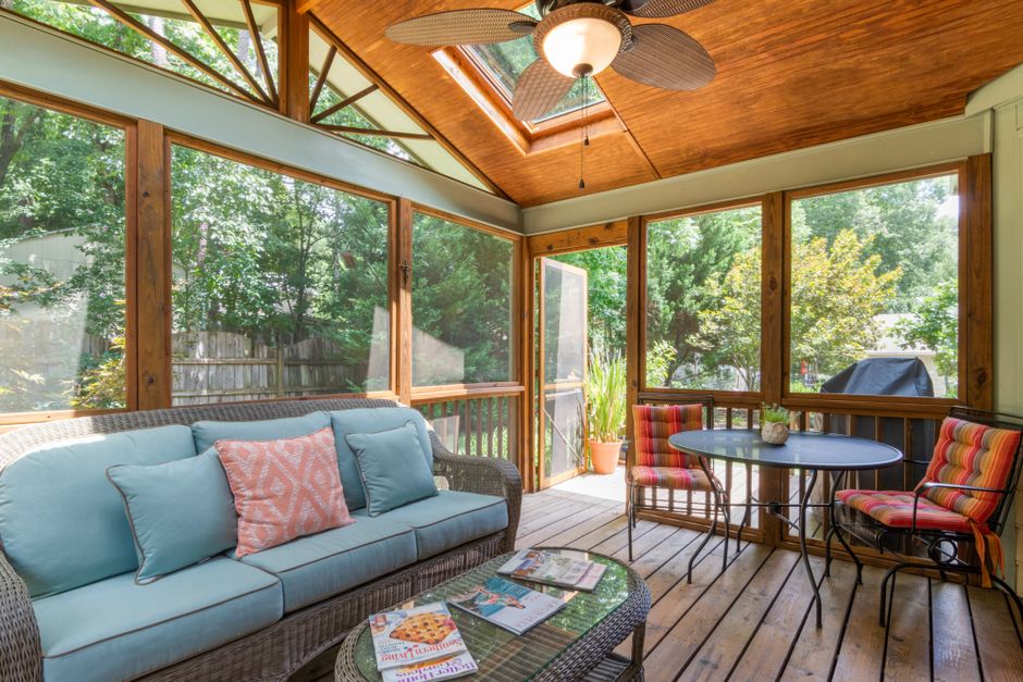 Cozy sunroom reading nook with cushioned seating